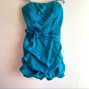 LE CHATEAU - Turquoise - cheetah pattern, flower and broach.